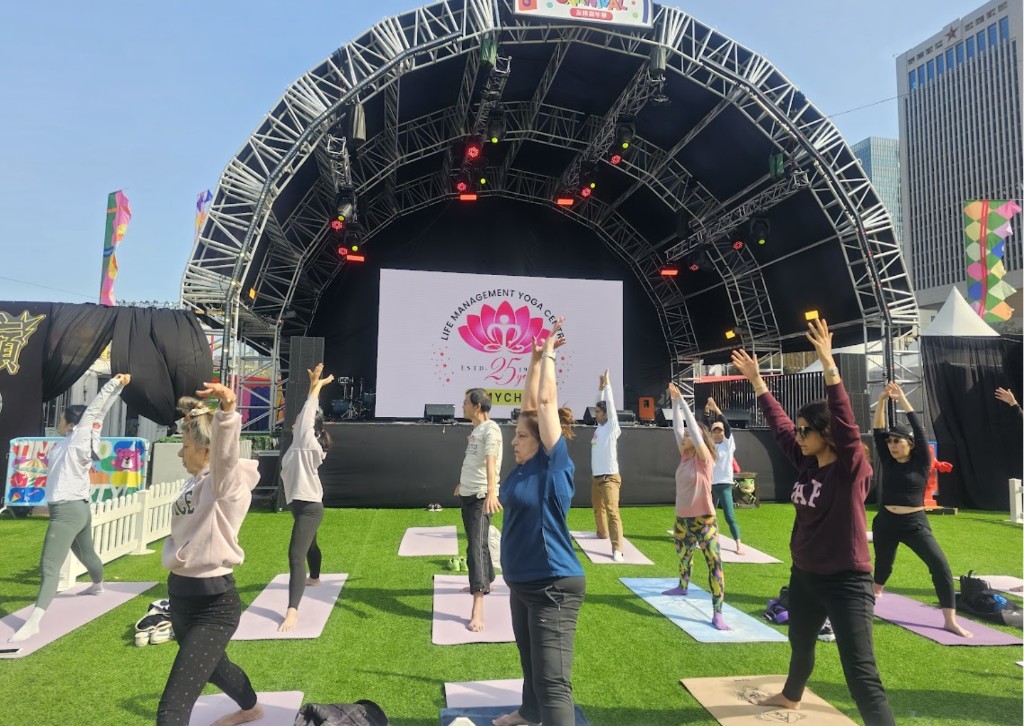 Yoga at AIA Carnival — outdoor session at Central Harbourfront, Hong Kong