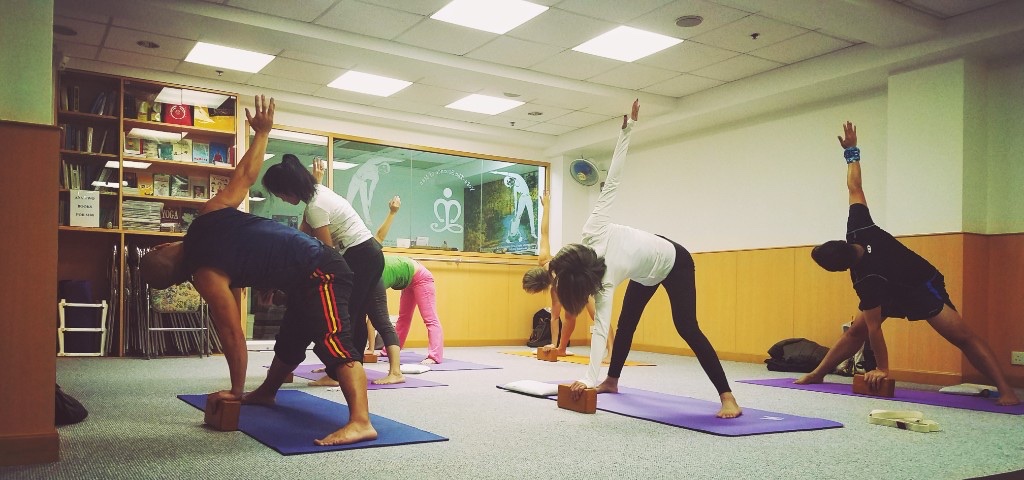 Group yoga class at Life Management Yoga Centre, Tsim Sha Tsui
